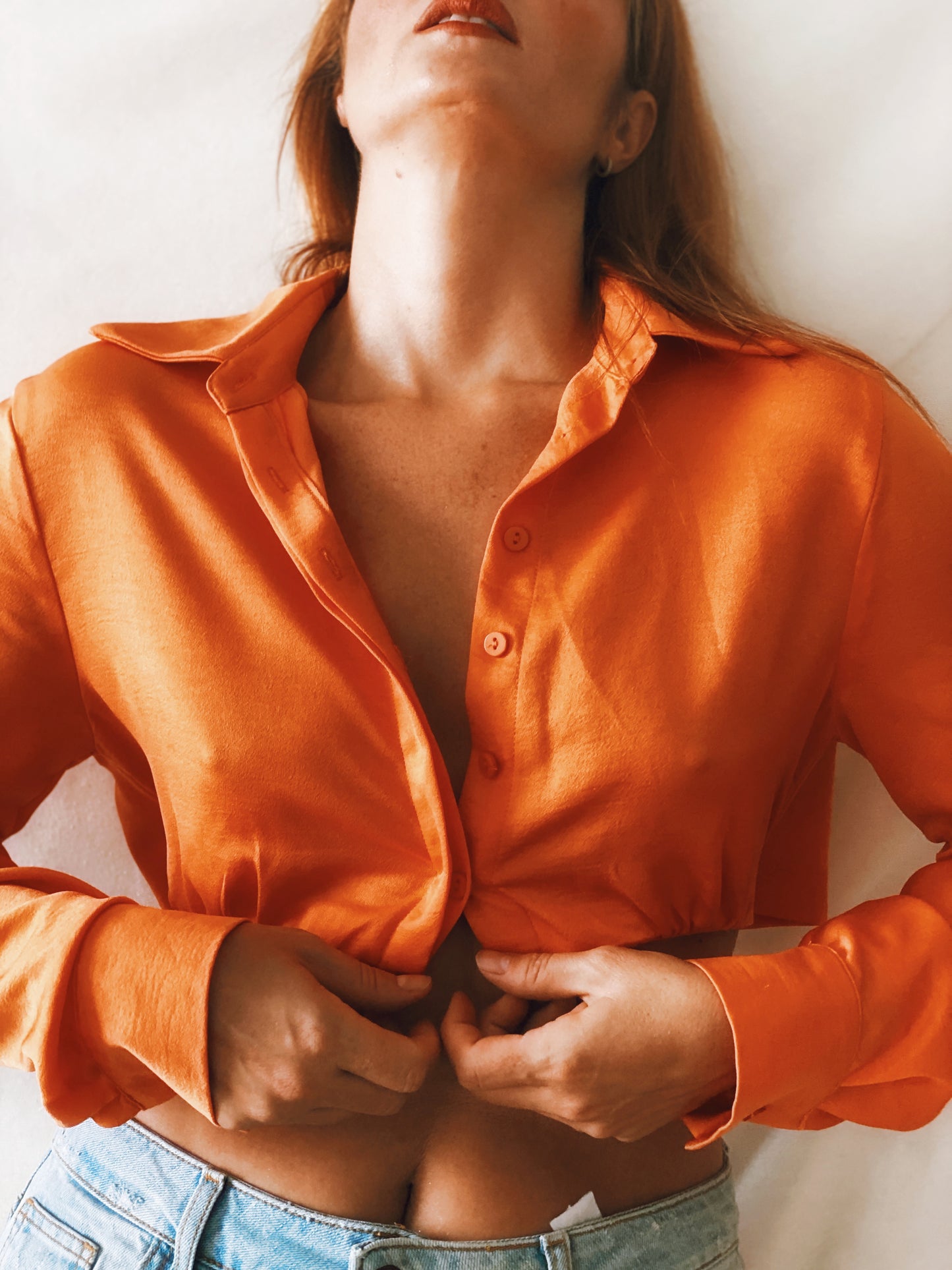 Orange satin blouse